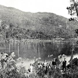 A party among the toi - toi beside Lake Rochfort, near Ngakawau.1923.