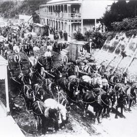 Wagons and horse teams hauling coal through Brunnerton.ca.1885.