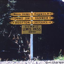 Right on the "border" - The Lewis Pass summit road sign, taken approx. 1962.