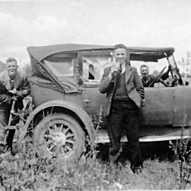 Frank Sullivan, Peter Molloy and Tom Mears with old car at Kotuku