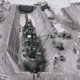 Bucket dredge Mawhera during its dry dock survey at Lyttelton around 1957 *PHOTO ALBUM*.