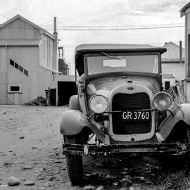 A Model A and an early Vanguard - Phase 2 I think - this is at the end of School Lane in Greymouth .1975..
