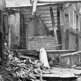 Storm damage - The demolished washhouse of the Presbytery of the Roman Catholic Church,Greymouth.1936.