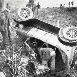 A car belonging to whitebait fishermen who were proceeding from Mokihinui to Westport.1930.