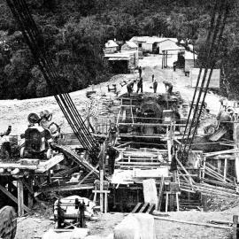 Workmen busy with anchor blocks on the Karangarua bridge.1939.