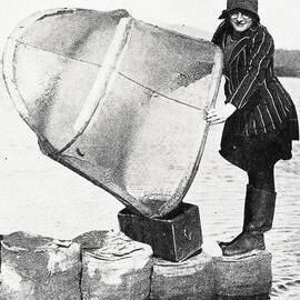 Joan Butland, whitebaiting on the Hokitika River.1932.
