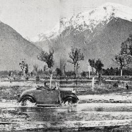 Fording a stream - Harihari , South Westland.1935.