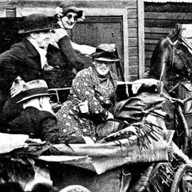  St. Patrick's procession wagon with two old residents, Mrs. Trouland and Mr. P. Kennan, in the rear seat. Greymouth.1938.