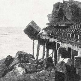  Large stones being tipped from trucks during the work of extending the Blaketown Tiphead at Greymouth.1932.