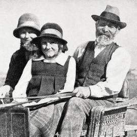 A farmer and his family ride in a horse drawn buggy,South Westland.1931.