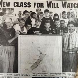 Patrick Smith Sealord Human Resources presenting the North School class with a chart of the NZ economic fishing zone.