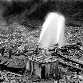 Hydraulic operations at the Hohonu Sluicing Company's claim at the Greenstone Creek.1933.