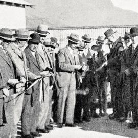 The ceremony of cutting the ribbons at Murchison - Official opening of a new scenic road from Picton  to the West Coast.1930.