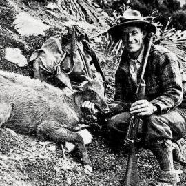 A hunter with a young tahr  in the Southern Alps.1932.