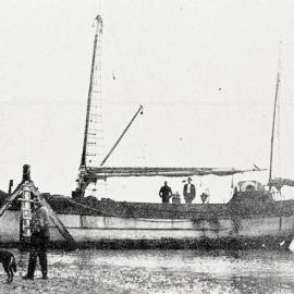 A coastal trader on the waterfront at Okuru Harbour, Westland.1922.