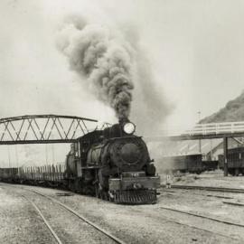 An Ab is dragging a train south out of Greymouth Station heading towards Hokitika