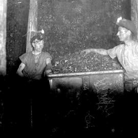 Coal miners and a wagon of coal, West Coast, circa 1903.