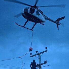 Helicopters doing lines work. Unknown information. *PHOTO ALBUM*