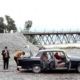 Car parked alongside Haast Bridge for a picnic, Jack Henderson (left ).1965.