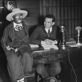 Old Greymouth radio station with black face and Uncle Mickey. Mick Spiers.