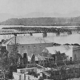 A view of Hokitika, showing the new railway bridge over the river.1903.