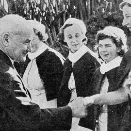 The Minister of Health, the Hon. H.T. Armstrong with Greymouth nurses.1940.