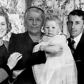 My Fisken Grandmother holding baby Beattie with Ira Beattie (Publican) at right, and Andrea? Beattie at left.Greymouth.