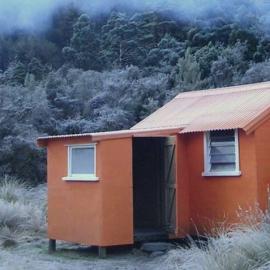 Historic Cedar Flat Hut - Located in Toaroha river valley - Whitcombe River area .