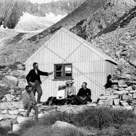Alec Graham, Peter Graham, and three other people at an unidentified hut
