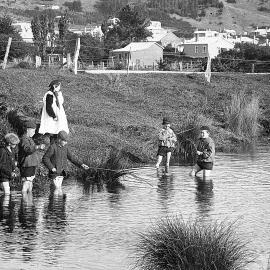 Children fishing.No date.