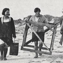 Mother and children help transport the family's gold-separating equipment along the beach near Bruce Bay.1933.
