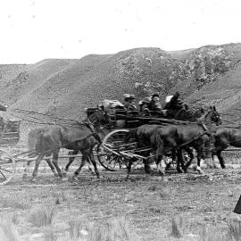 Horse-drawn tourist coaches on the road to Arthurs Pass.1913.