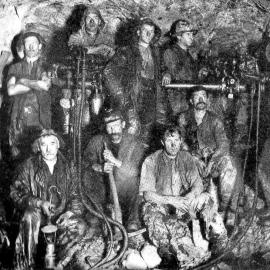 Drillers at the face of the Otira Tunnel, 1918.